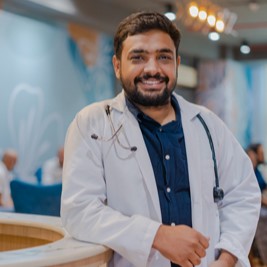 Vetic Veterinarian Dr Abhishek Choudhary BVSc & AH - 5 years veterinary experience - internal medicine - emergency and ICU - standing with a horse - possibly during equine medicine training